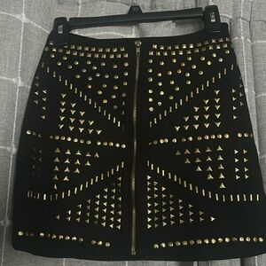 Large black skirt with gold studs